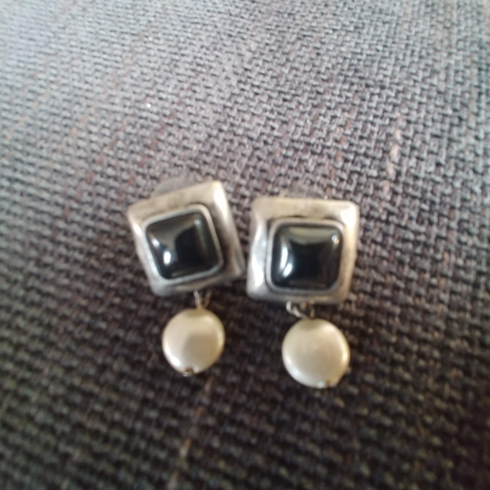 Stud style silver and pearl earrings